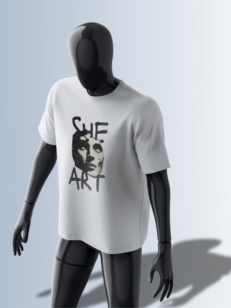 She Art Tee, close-up of 'SHE ART' hand-lettered text.