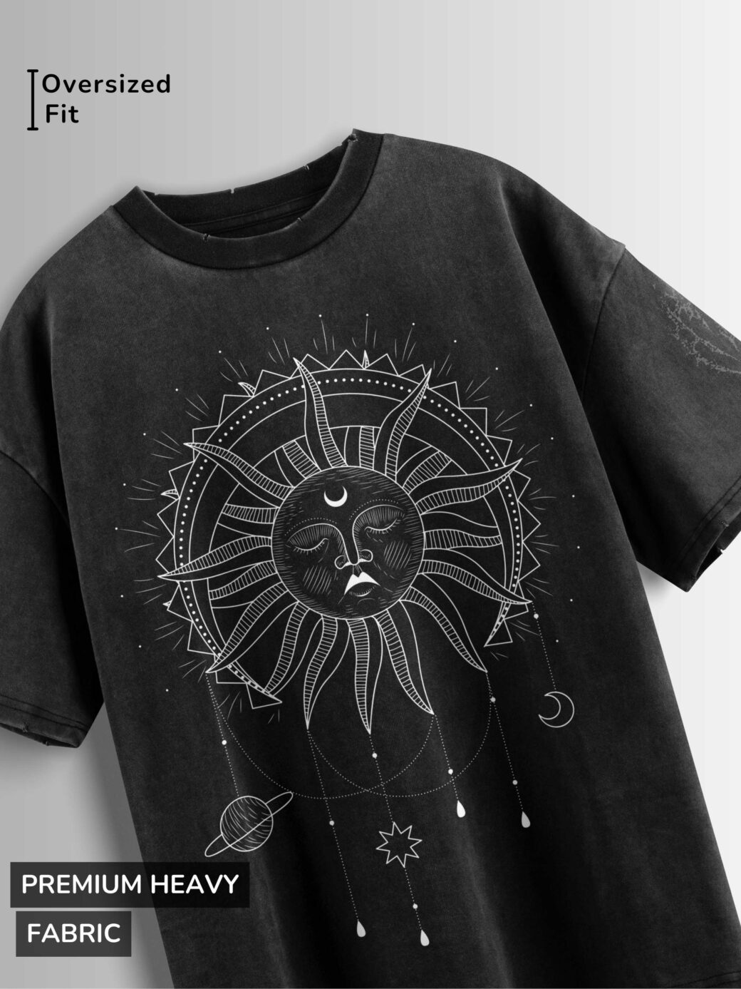 Distressed black oversized T-shirt with a sun and moon graphic and celestial elements.