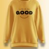 Bright yellow oversized sweatshirt with the phrase 'Life Is So Good' and a minimalistic smiley face.