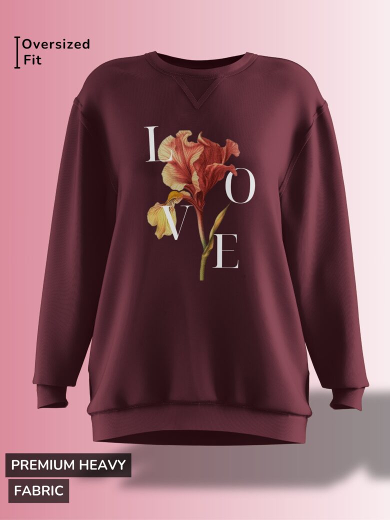 Deep burgundy oversized sweatshirt featuring a floral design with the word 'LOVE' elegantly placed around the flower.