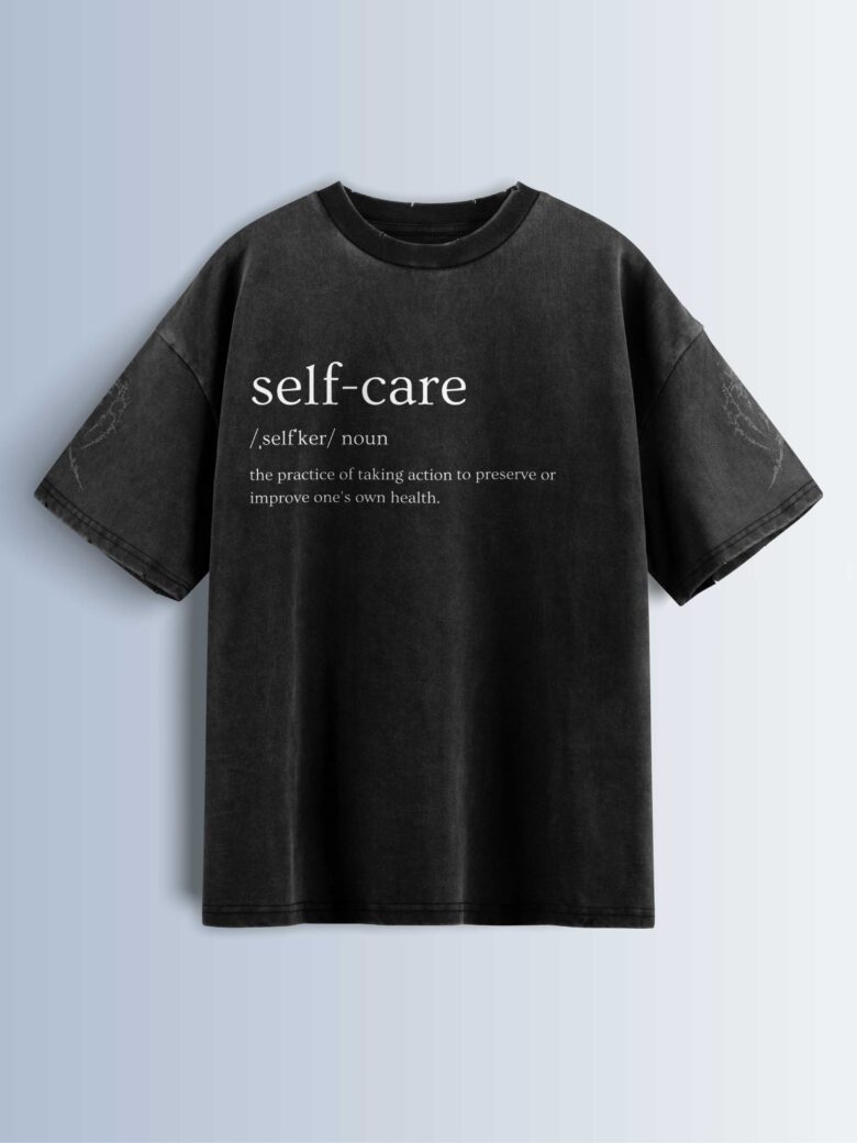 Distressed black oversized T-shirt with 'self-care' text, phonetic pronunciation, and definition.