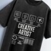 Distressed black oversized T-shirt with 'CREATIVE ARTIST' text and icons representing multi-tasking, decision making, coffee lover, and travel.