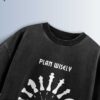 Distressed black oversized T-shirt with a chess piece clock graphic and 'PLAN WISELY' and 'PLAY QUICKLY' text.