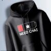 Black hoodie with a graphic showing a low battery symbol with a tea cup icon and the text "NEED CHAI."