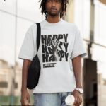 White oversized T-shirt featuring a distorted 'HAPPY' typography with a black-and-white reaching hand graphic.