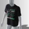 Black oversized T-shirt featuring a neon green & white doodle of an astronaut, rocket, planets, and stars with 'SPACE SPACEMAN' text.