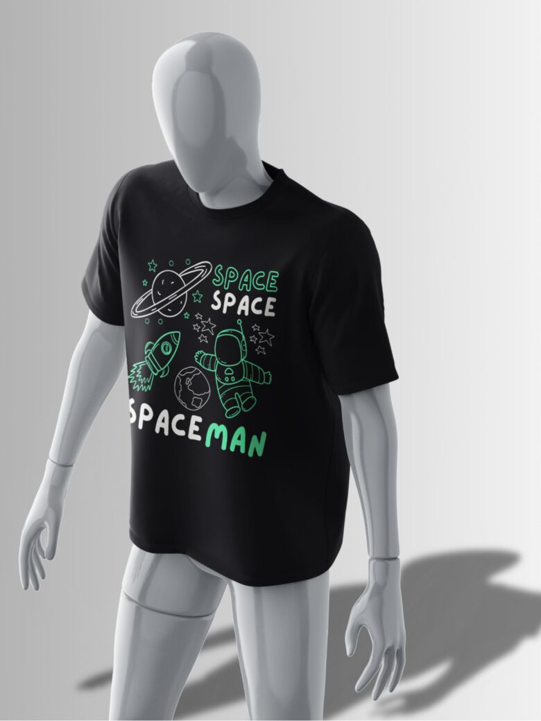 Black oversized T-shirt featuring a neon green & white doodle of an astronaut, rocket, planets, and stars with 'SPACE SPACEMAN' text.