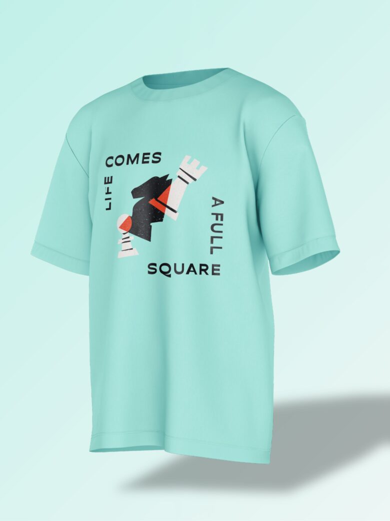 Mint green oversized T-shirt featuring an abstract black chess knight with typography reading 'LIFE COMES A FULL SQUARE'.