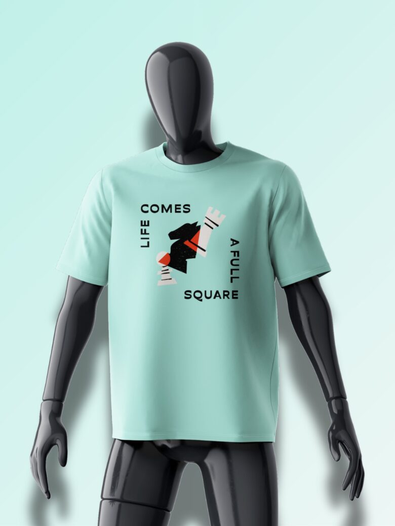 Mint green oversized T-shirt featuring an abstract black chess knight with typography reading 'LIFE COMES A FULL SQUARE'.