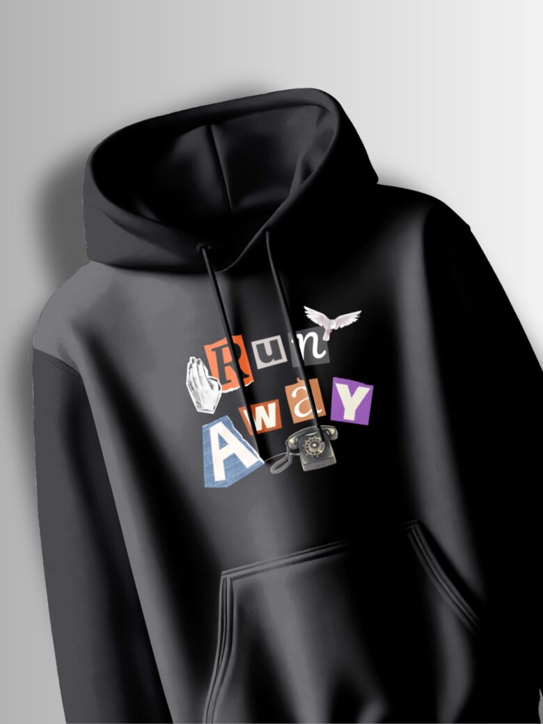 Black hoodie with the words "Run Away" in a collage-style design with fragmented letters and whimsical imagery like a telephone and butterfly