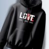 Black hoodie with the word "LOVE" in white, with the "O" replaced by "LUST" in red, and the phrase "LOST LOVE" in white below.