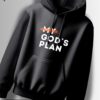 Black hoodie with the words "GOD'S PLAN" in white and "MY" crossed out in orange above it.