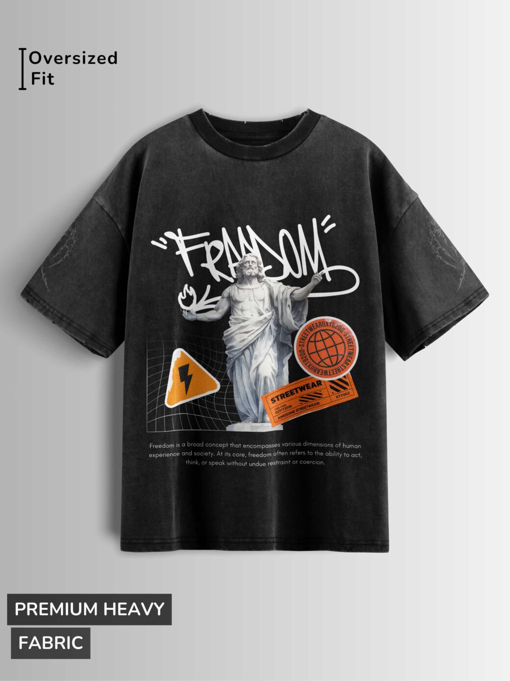 Distressed black oversized T-shirt with 'FREEDOM' graffiti text, classical statue graphic, and freedom definition text.