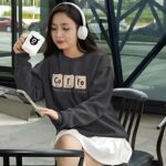 Black sweatshirt featuring a chemistry-inspired design spelling 'Co-Fe' with periodic table elements and the phrase 'Makes Perfect Sense' below.